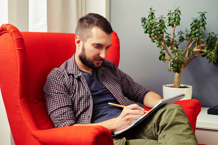 Man Filling Out Form